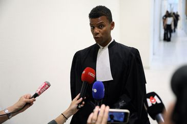 Yassine Bouzou, lawyer of the family of Nahel, a 17-year-old teenager killed by a French police officer during a traffic check in Nanterre, talks to journalists at the courthouse in Paris, France, June 28, 2023. REUTERS/Guillaume Saligot